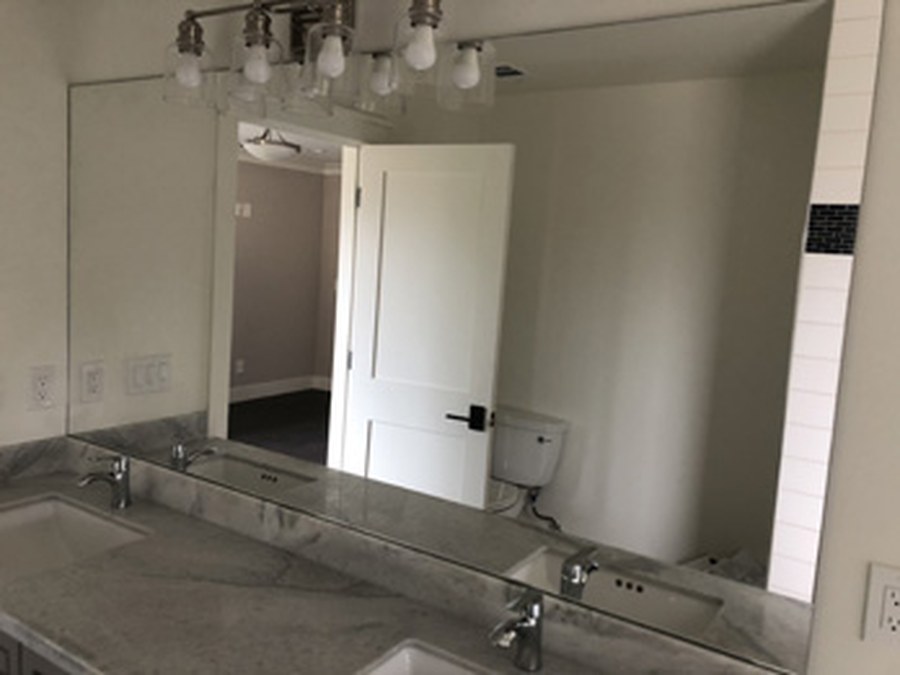 Wall mirror by Bay Glass & Shower